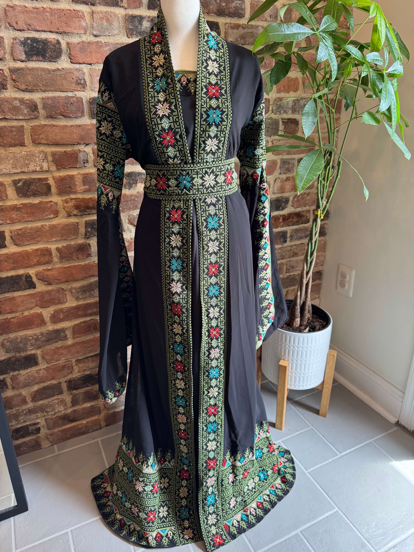 Front view of black abaya set with green embroidery – luxury modest wear for women in the USA