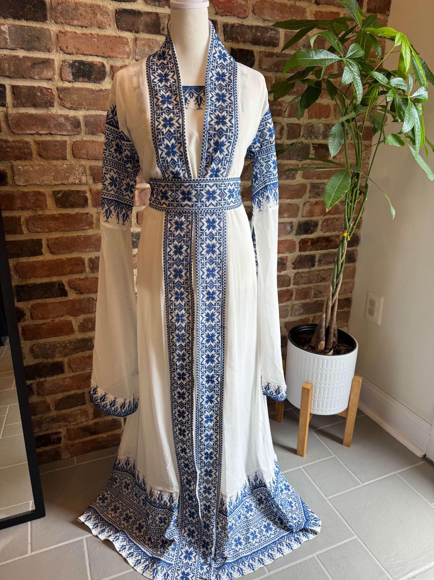 Front view of luxury white abaya set with blue embroidery – elegant modest wear for women in the USA