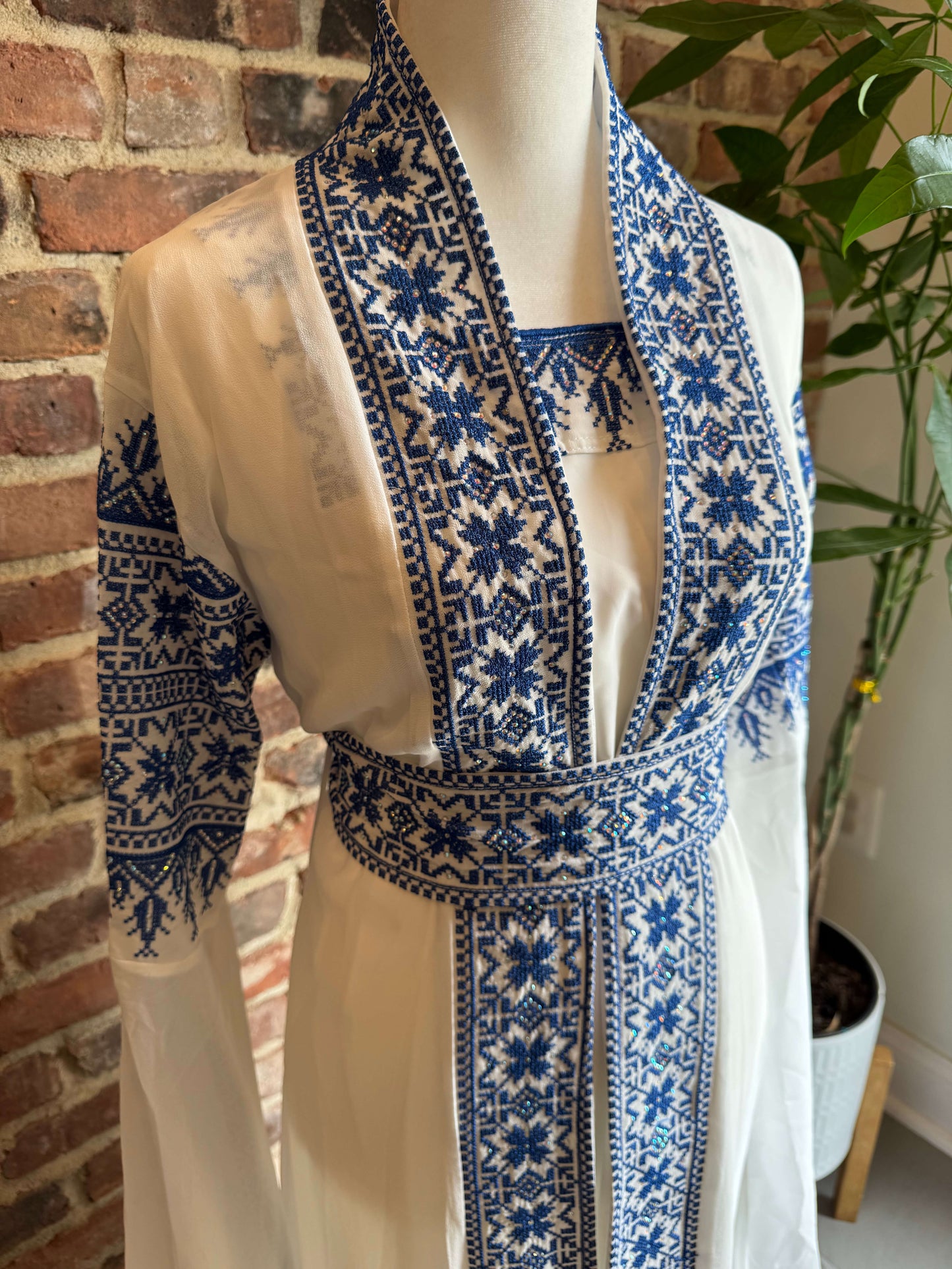 Side view of luxury white abaya set with blue embroidery – modest fashion for women in the USA