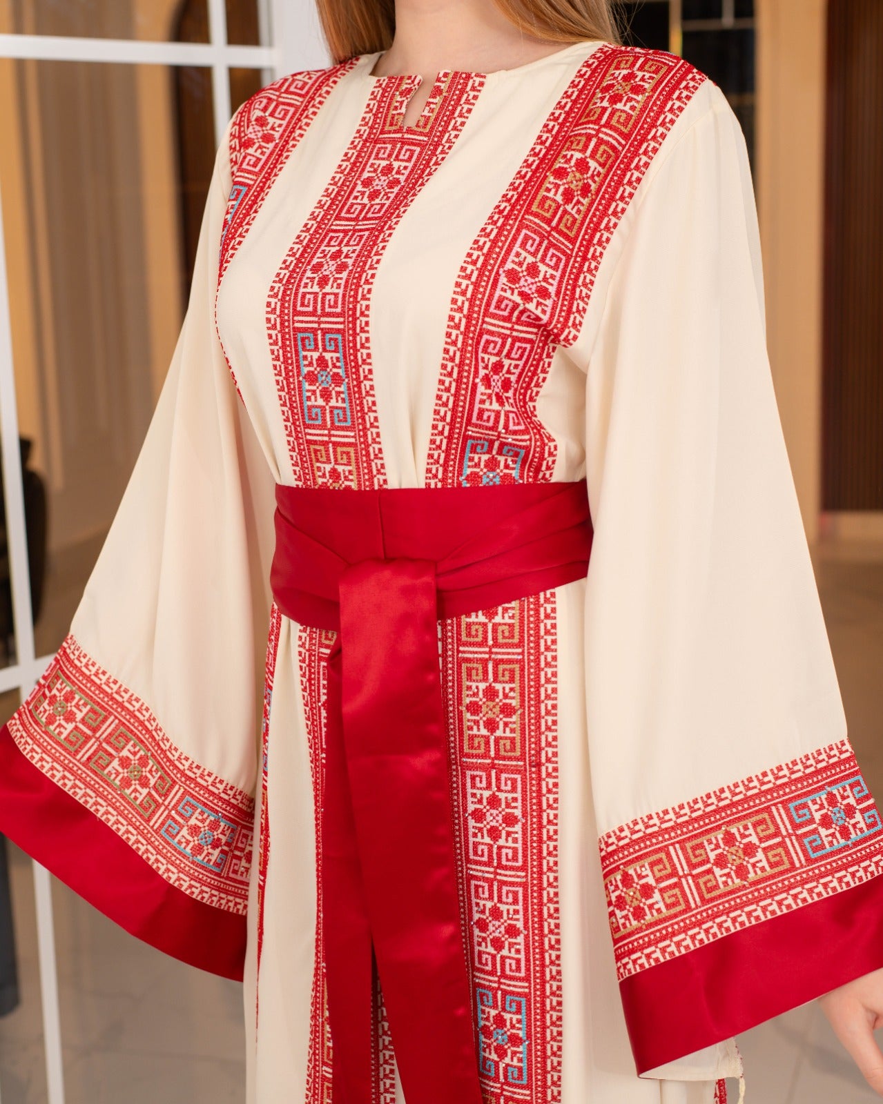 Cream and red Palestinian embroidered thobe with satin belt