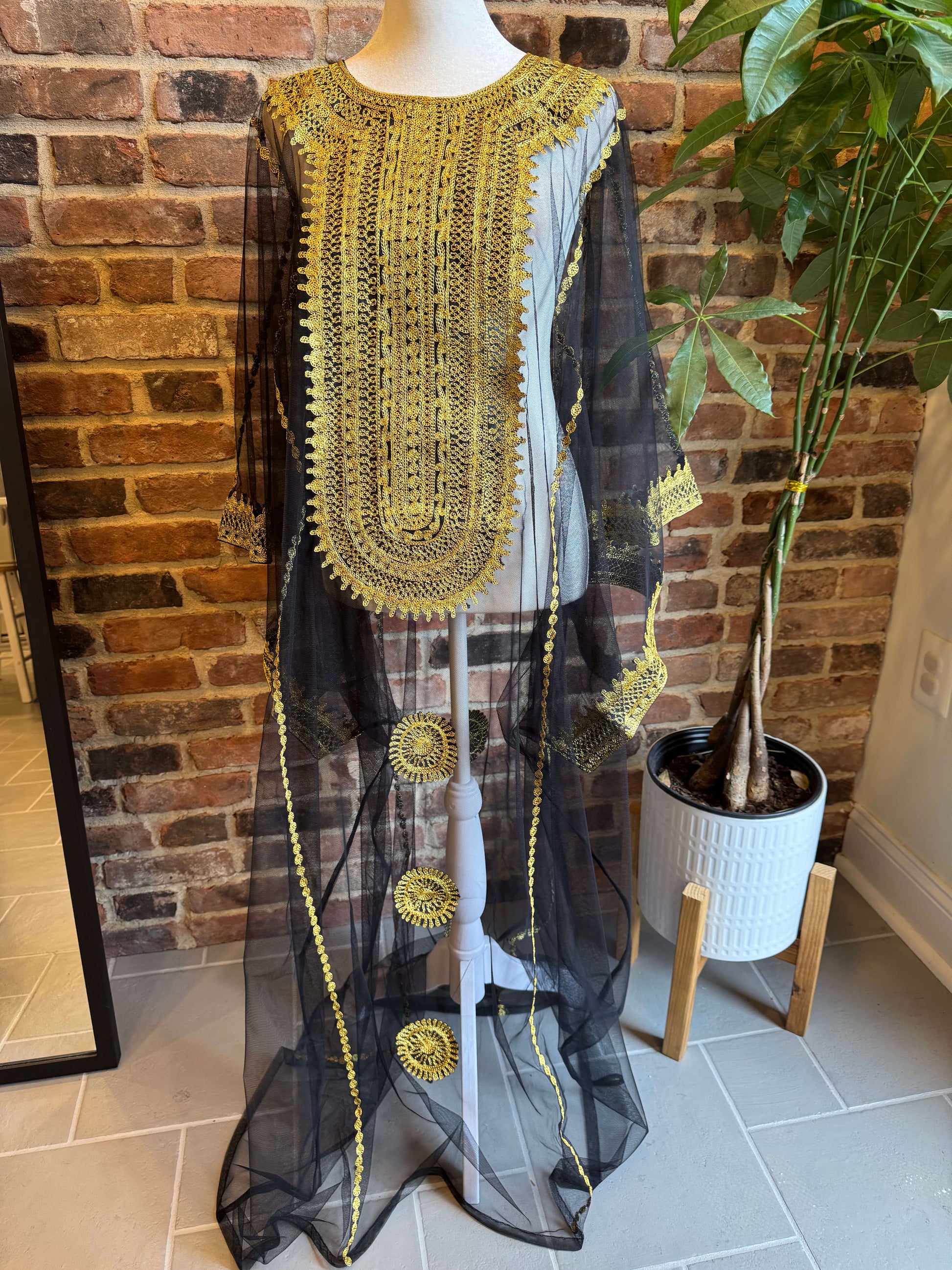 Front view of Iraqi Hashimi Thobe Dress in black tulle with gold embroidery