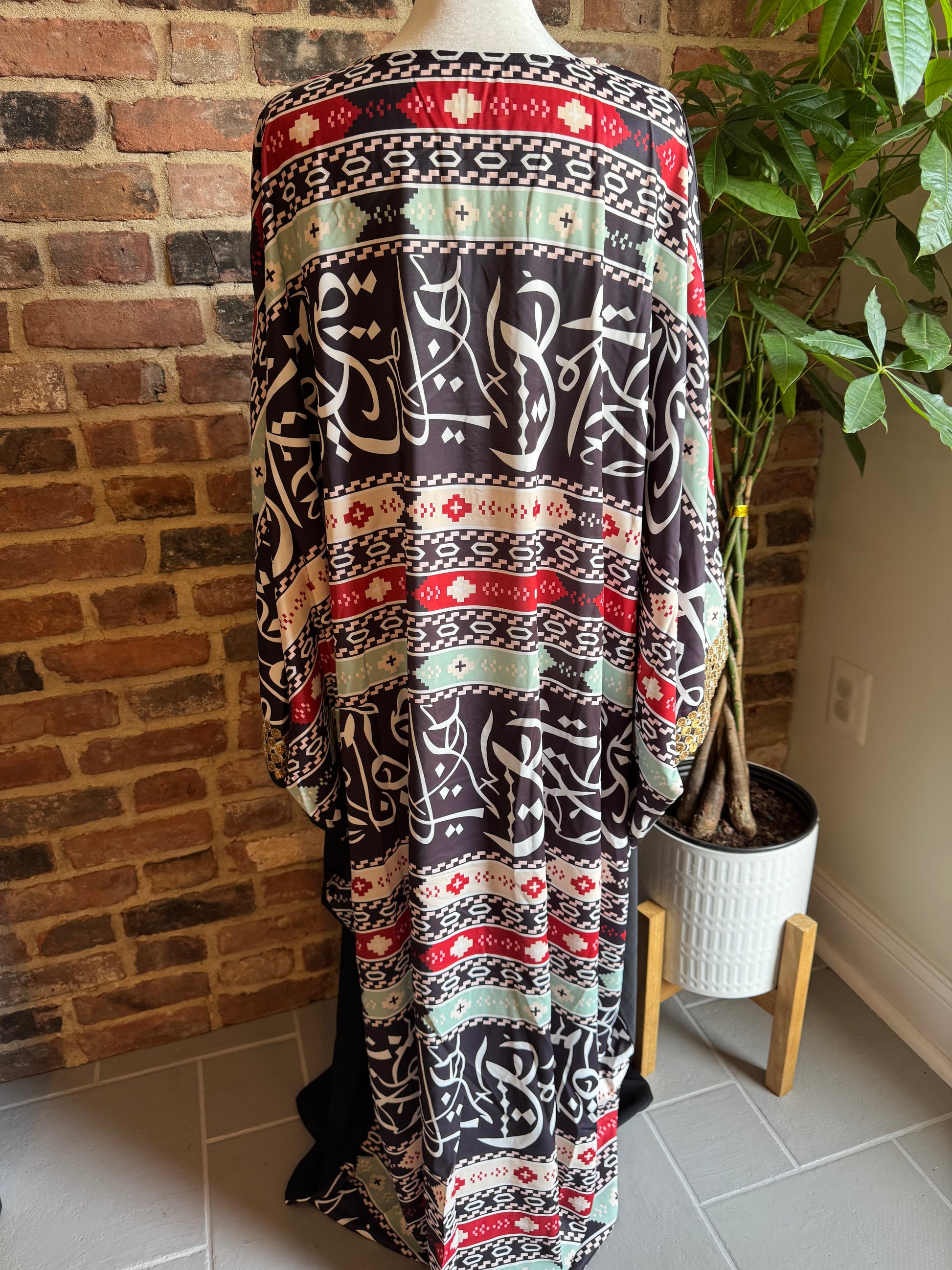 Modern modest dress with Arabic writing design