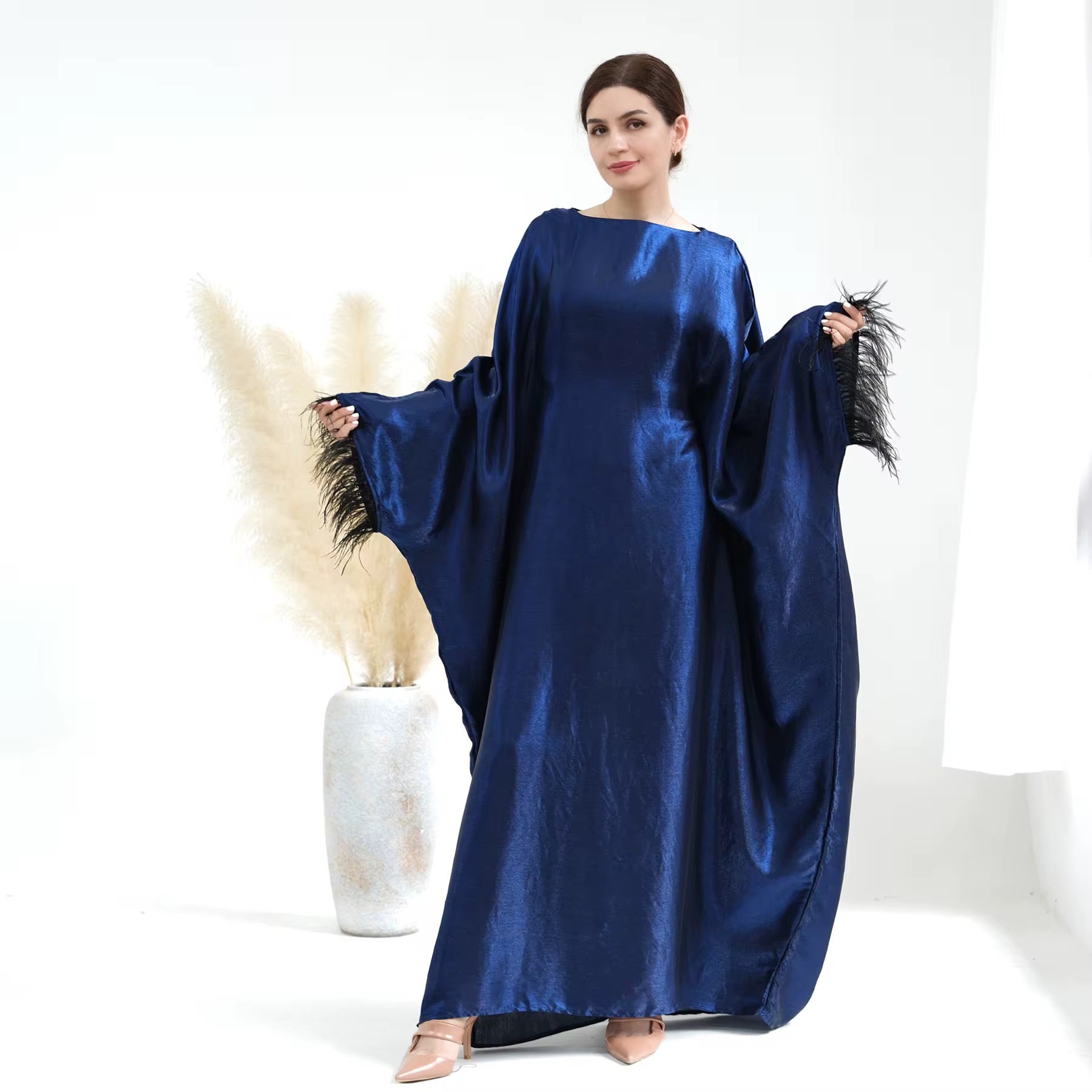Elegant abaya party dress with feathers